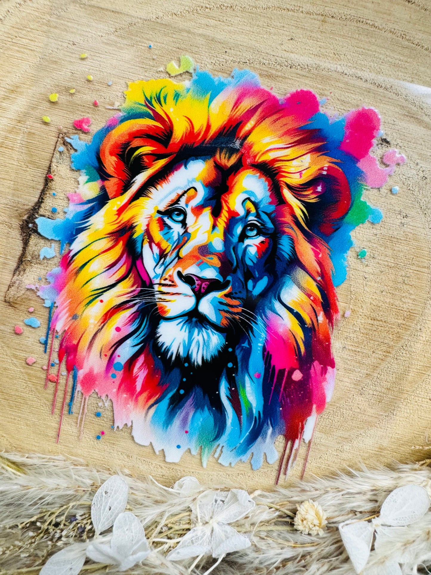UV-Sticker mit einem Löwenkopf in bunten Aquarell Farben