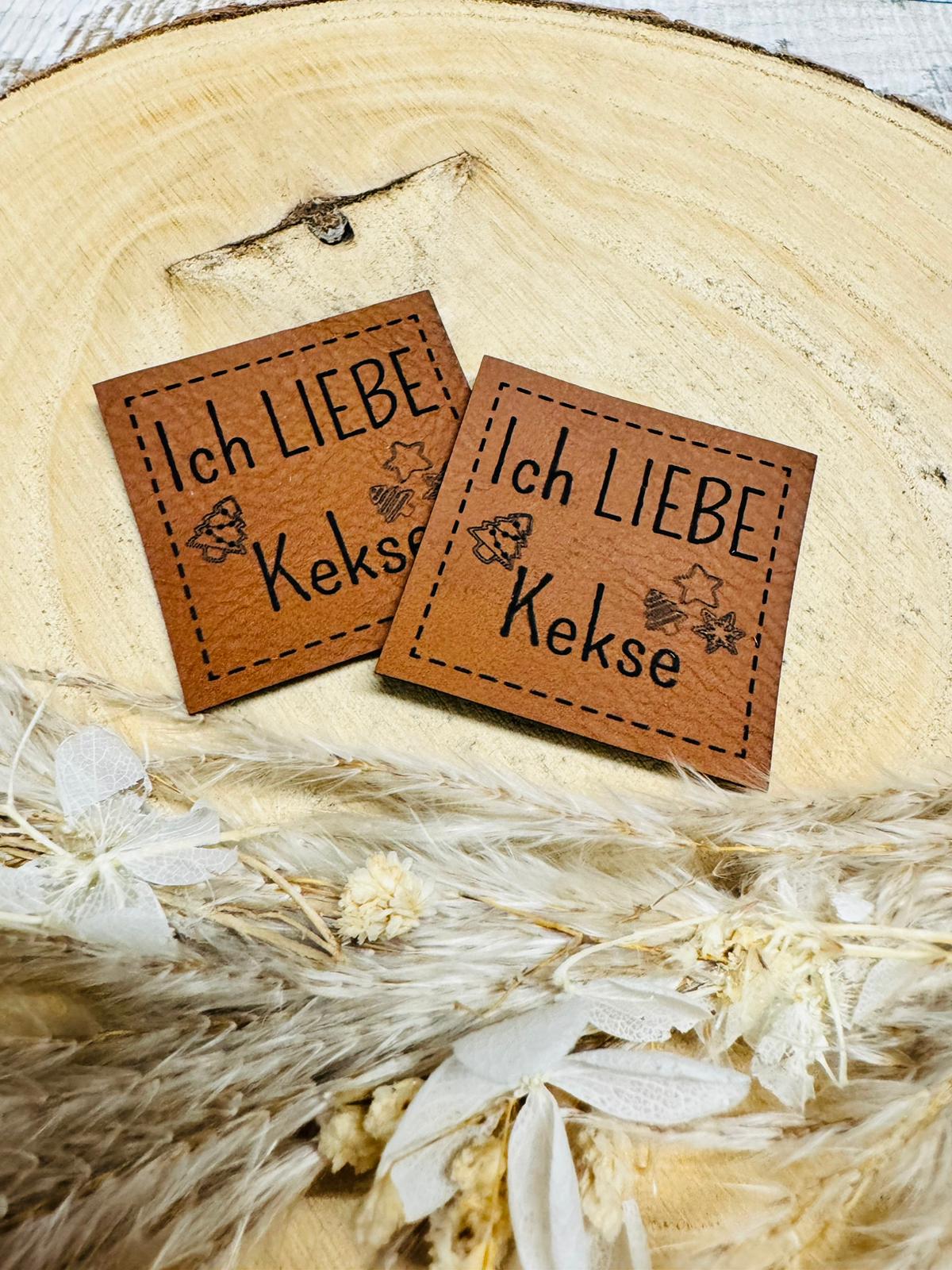 braunes christmas kunstlederlabel mit dem spruch ich liebe kekse