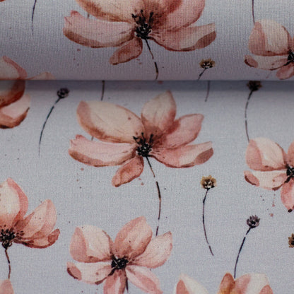 wunderschöner Stoff Jersey mit rosa Blumen Motiven auf hellem Hintergrund