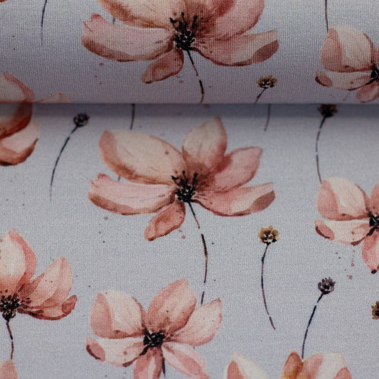 wunderschöner Stoff Jersey mit rosa Blumen Motiven auf hellem Hintergrund