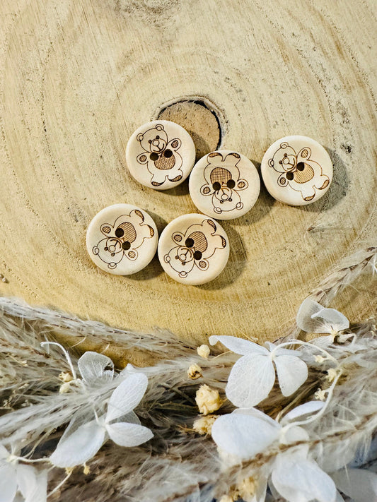 Holzknopf rund mit einem abgebildeten Teddy