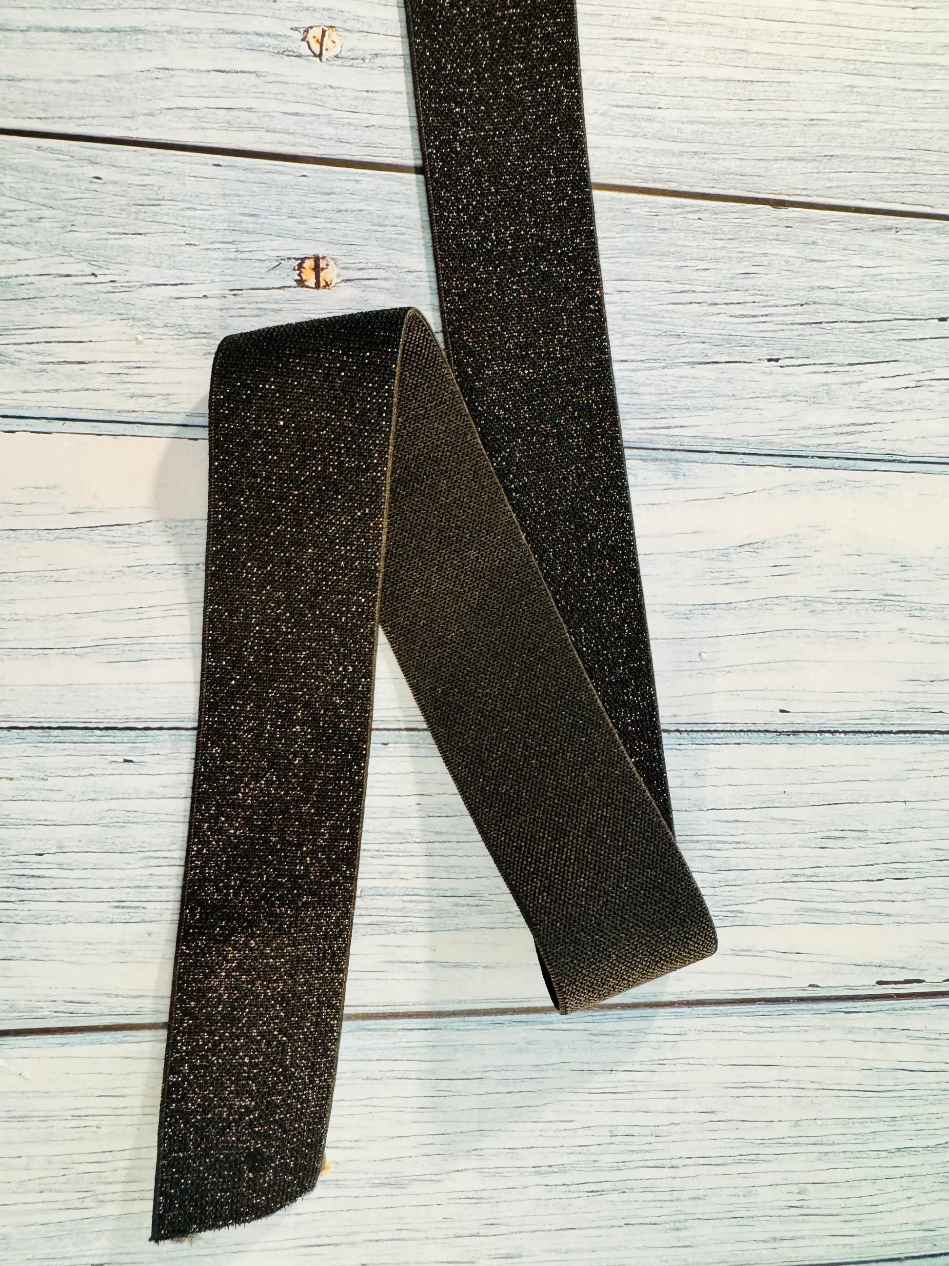 elastisches Gummiband mit Glitzereffekt schwarz, Breite vier Zentimeter