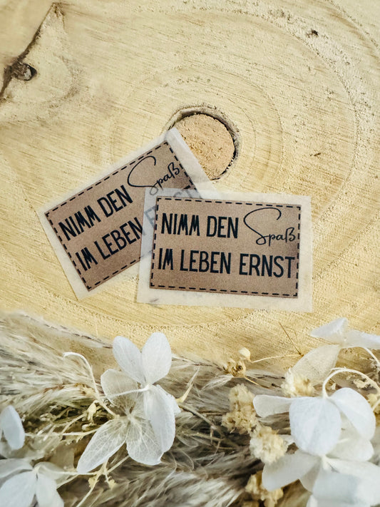 Bügellabel nimm den Spaß ernst