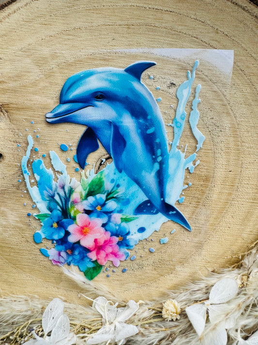 UV-Sticker mit einem kleinen Delfin aus dem Wasser springend in farbe Blau