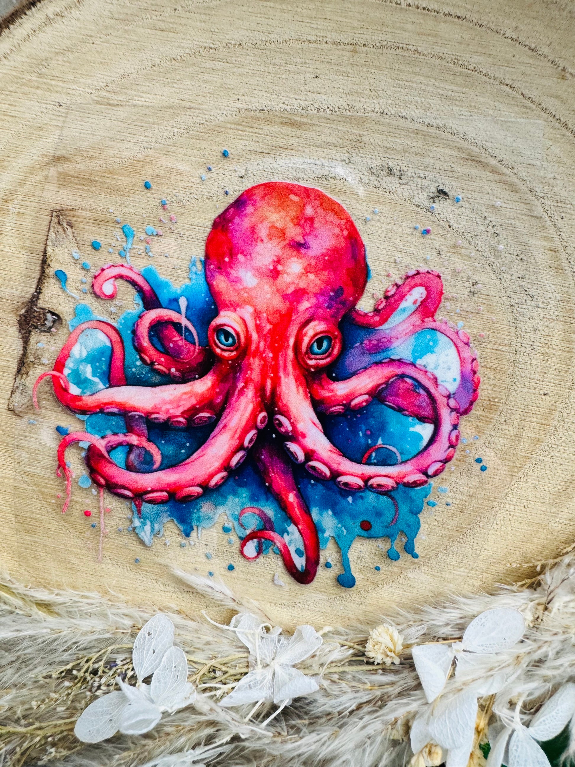 UV-Sticker mit einem roten Kraken im blauen Wasser in Aquarell Farben