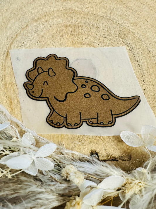 braunes Bügellabel etikett mit einem kleinen Dino