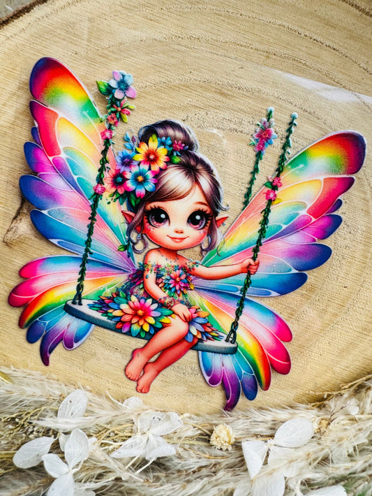 UV-Sticker mit einer kleinen Fee die schaukelt in bunten aquarell farben