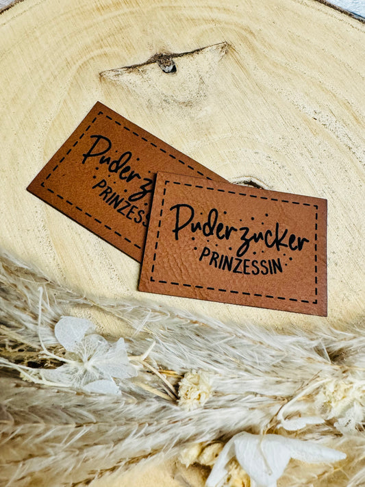 braunes christmas kunstlederlabel mit dem spruch puderzucker prinzessin