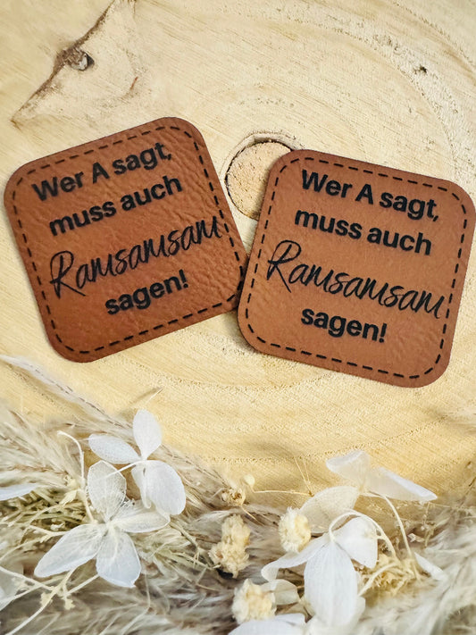 superweiches braunes Label mit Spruch Wer a sagt, muss auch Ramsamsam sagen