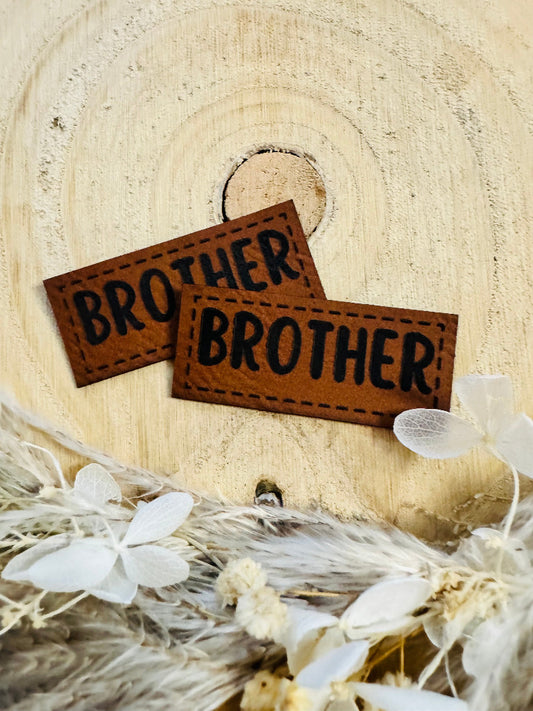 superweiches braunes Kunstlederlabel mit dem Wort BROTHER