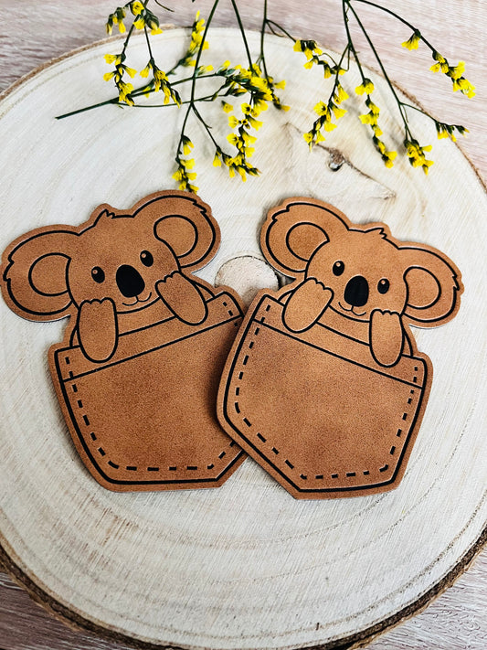 braunes taschen kunstlederlabel mit einem koala