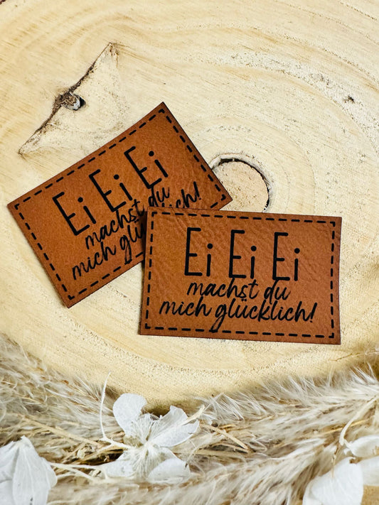 superweiches braunes Kunstlederlabel mit dem Spruch EiEiEi machst du mich glücklich