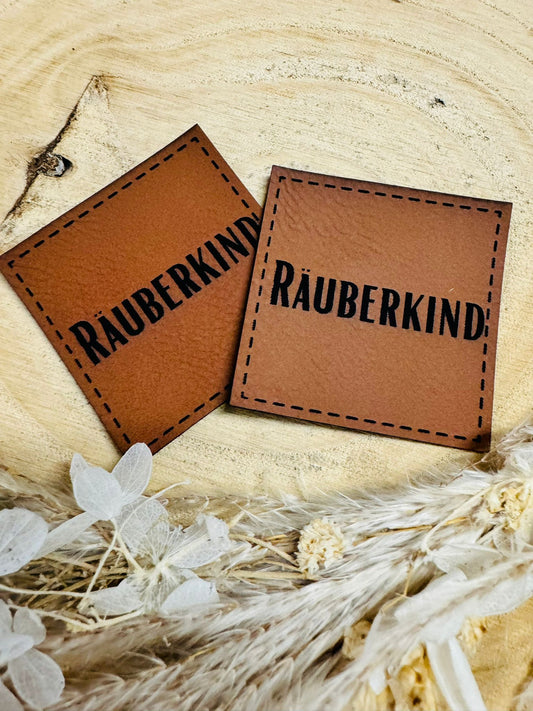 braunes PU-Label mit der Aufschrift Räuberkind