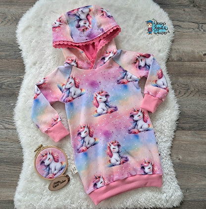 Stoff Einhorn sitzend