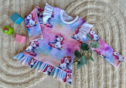 Stoff Einhorn sitzend