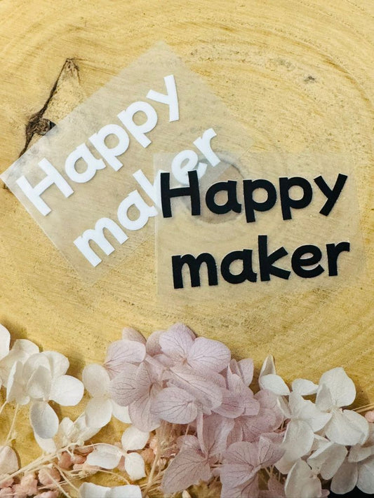 aufbügelbares Label mit dem Spruch Happymaker in schwarz und weiss