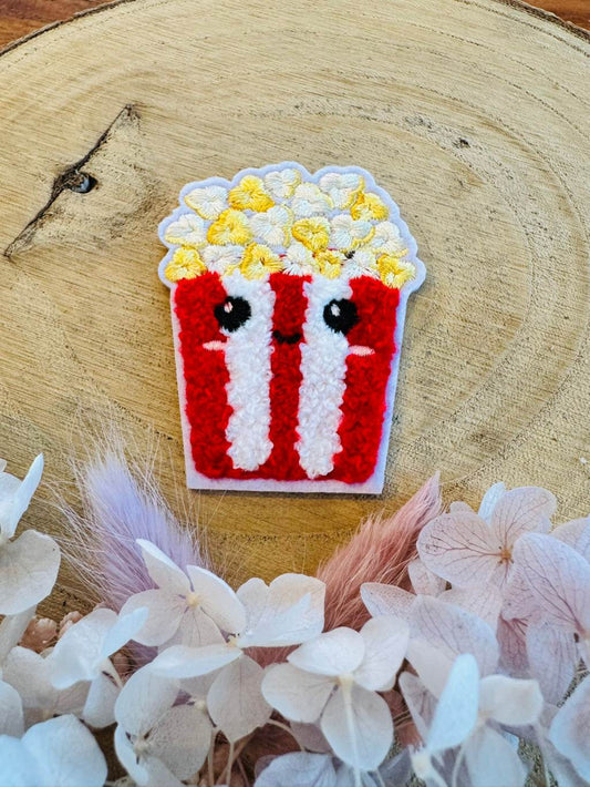 exclusives Chenille patch mit einer tollen 3D Optik und einer abgebildeten lustigen Popcorn Tüte 