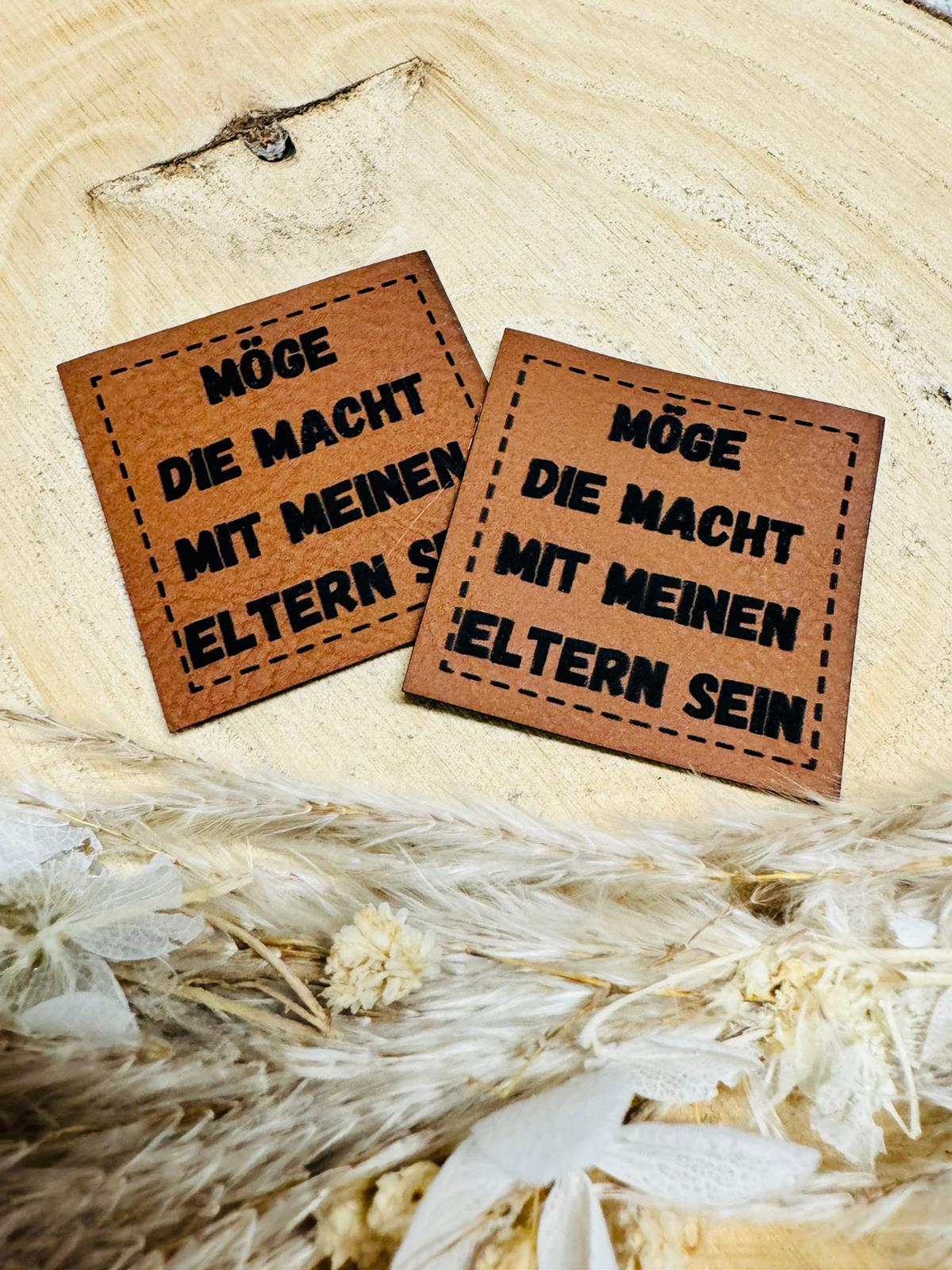 braunes christmas kunstlederlabel mit dem spruch möge die macht mit meinen eltern sein