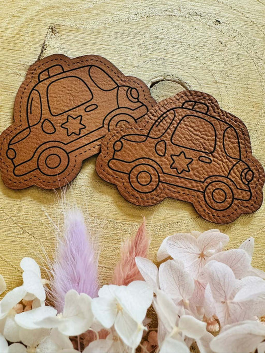 superweiches braunes Kontur Kunstleder Label mit einem Police Car abgebildet