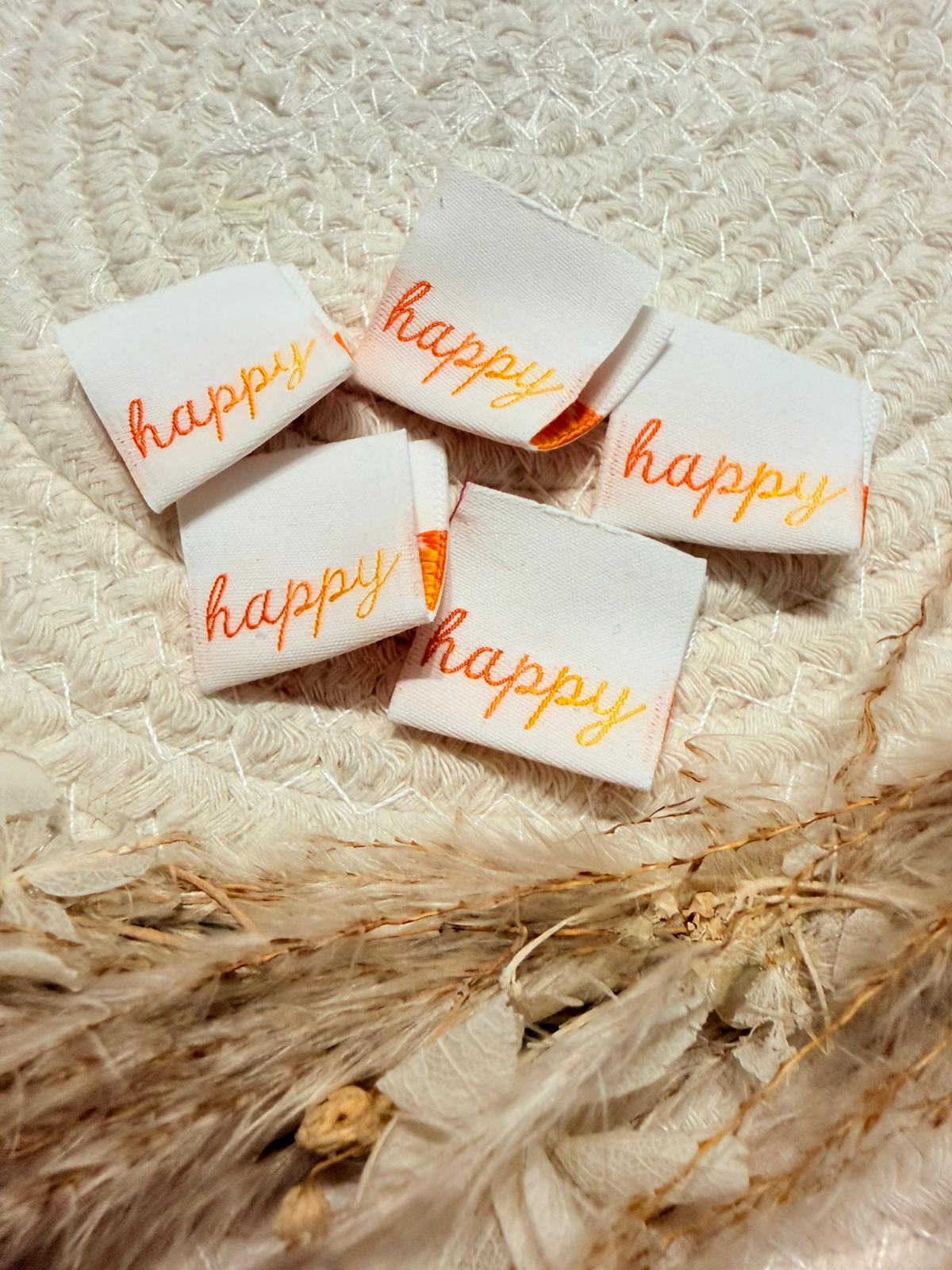 tolles weisses Weblabel mit Aufschrift Happy in orangener Schrift