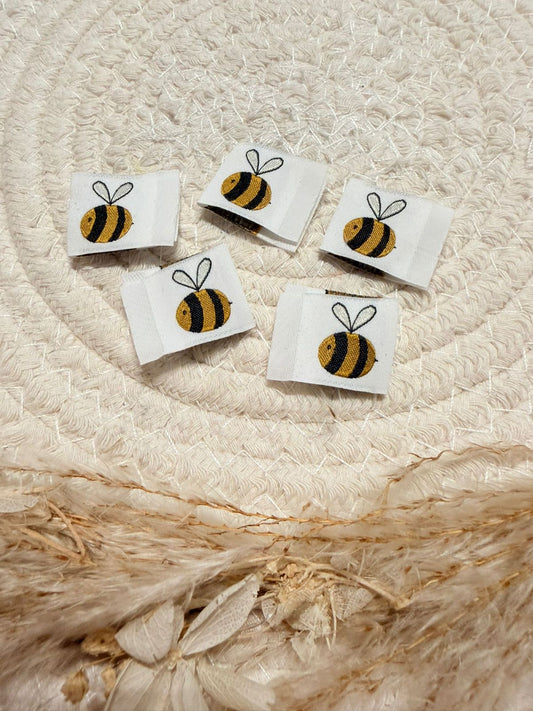 tolles weisses Weblabel von den Bienenkinder mit einer kleinen süssen Biene abgebildet