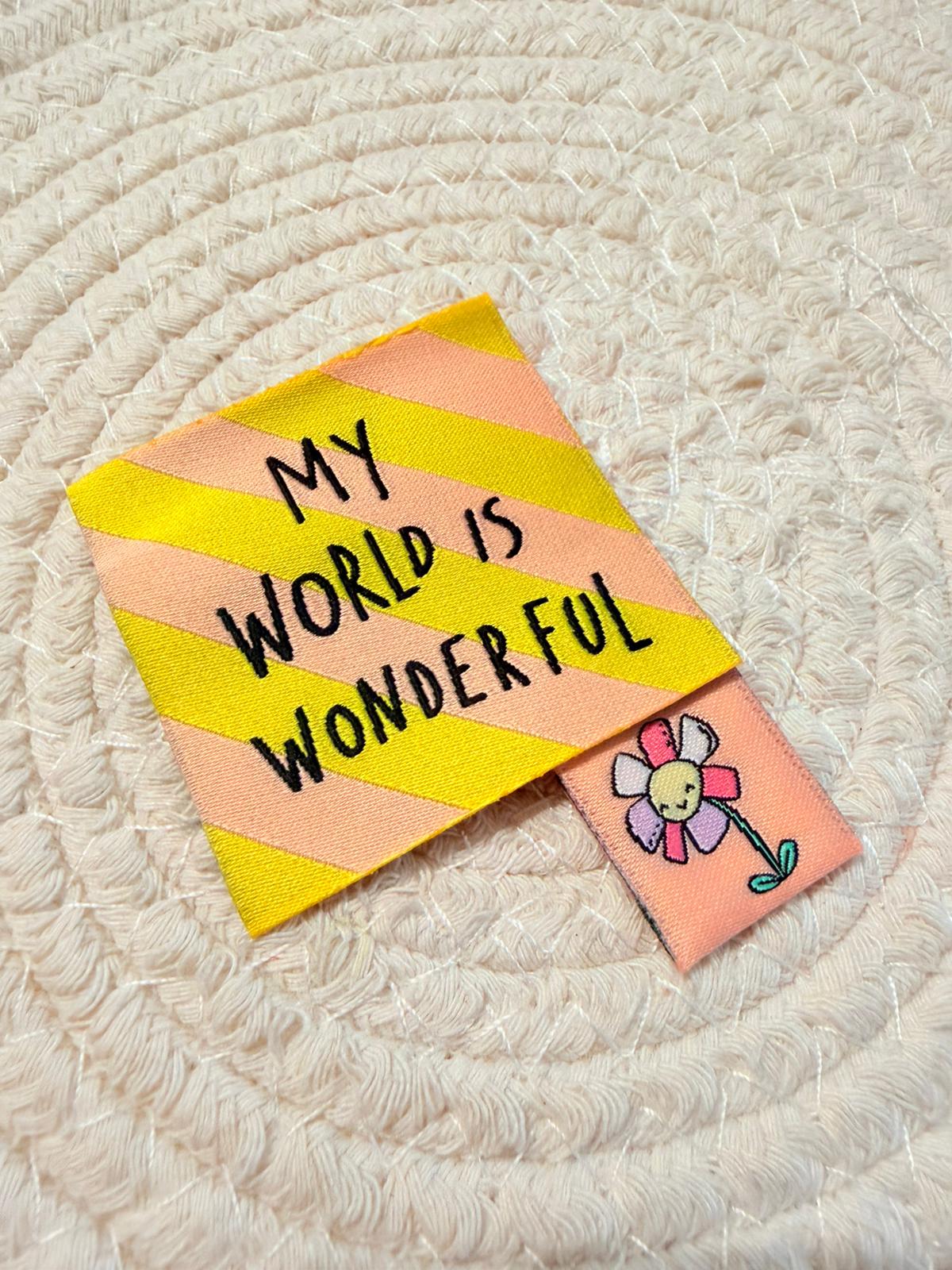 Weblabel My World is Wonderful und ein kleines Gänseblümchen Collage