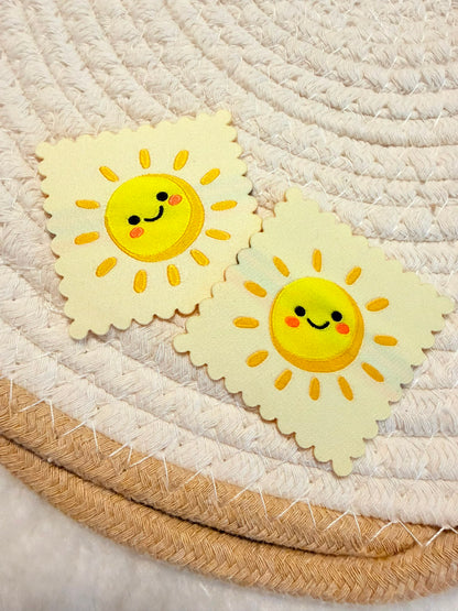 tolles XXL Weblabel zum Aufbügeln mit einer lächelnden strahlenden Sonne abgebildet